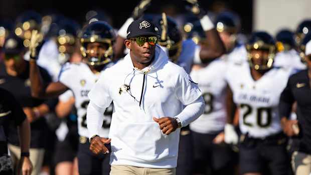 Colorado Buffaloes head coach Deion Sanders against the Arizona State Sun Devils at Mountain America Stadium